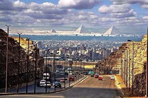 The pyramids as seen from the center of Cairo : r/pics