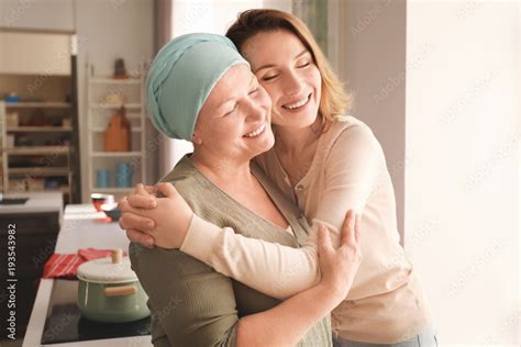 Young woman visiting her mother with cancer indoors Stock Photo | Adobe ...