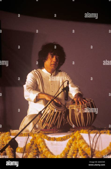 Zakir hussain playing tabla hi-res stock photography and images - Alamy