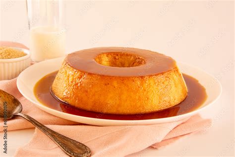 Creme Caramel Condensed Milk Pudim with melting caramel topping in front view Stock Photo ...