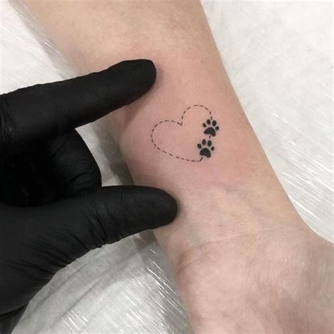 47 Tiny Paw Print Tattoos For Cat And Dog Lovers | Pawprint tattoo, Tattoos, Print tattoos