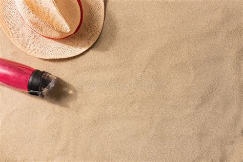 Water Bottle and Straw Hat on Sand Stock Photo - Image of vacation, vibes: 187159074