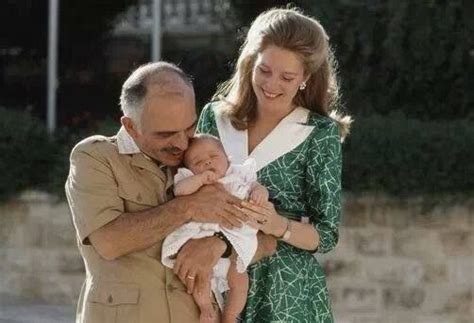 King Hussein and Queen Noor with their newborn daughter, Princess Iman Al Hussein, who is t ...