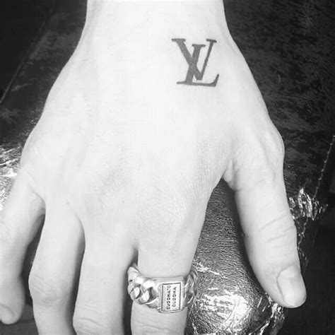 LV tattoo (louis vuitton) | V tattoo, Initial tattoo, Minimalist tattoo