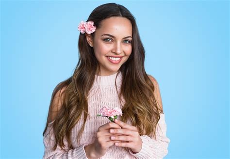 Premium Photo | Smiling lady with flowers