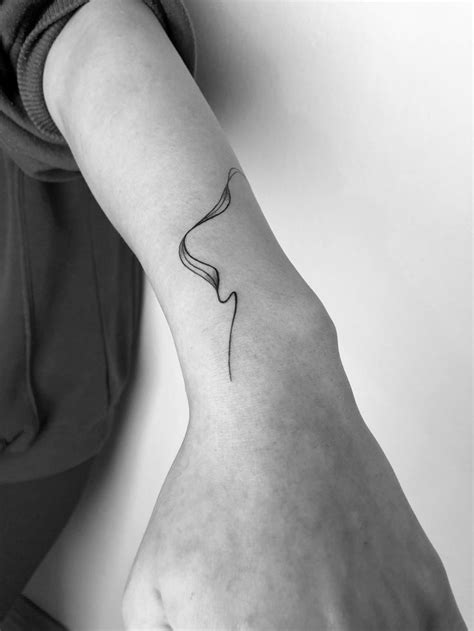 Elegant Abstract Flow Tattoo