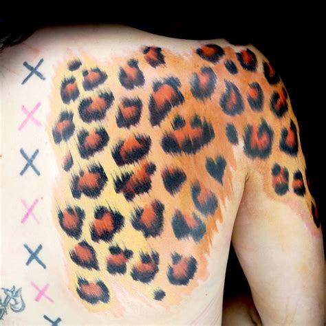 Cheetah Skin Tattoo by Chris Blinston | Cheetah skin, Ink master, Cool tattoos