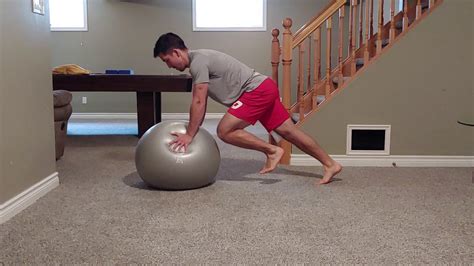 Stability Ball Push Up Plank + High Knee Single Exchange - YouTube