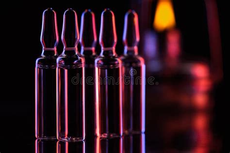 Transparent Glass Ampoules with Substance on Table Stock Image - Image ...