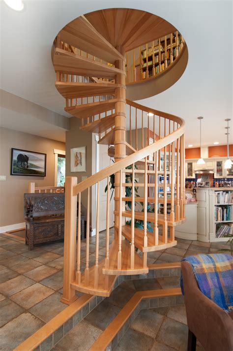 Spiral staircase in living room of a Bowen Island home #blurrdMEDIA #architecture #photography ...