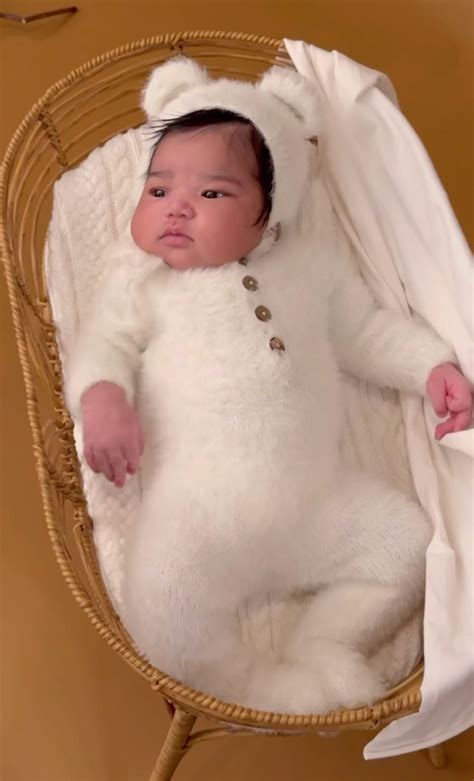 Russell Wilson Shares Photo of Ciara Cradling Baby Amora