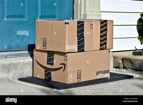 Amazon Prime boxes delivered to the front door of a home Stock Photo ...