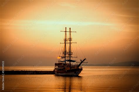 Ship silhouette at sunset Stock Photo | Adobe Stock