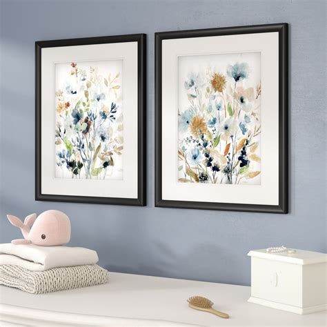Or this set of framed flower prints that you can place on a blank wall that's currently begging ...