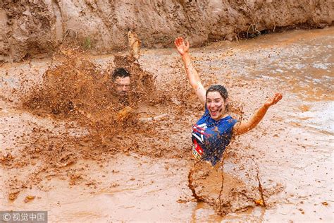 Getting messy in a mud race - CGTN