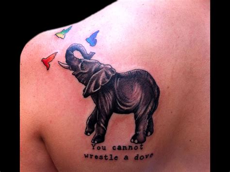 Quality Colored Elephant Tattoo On Back Shoulder