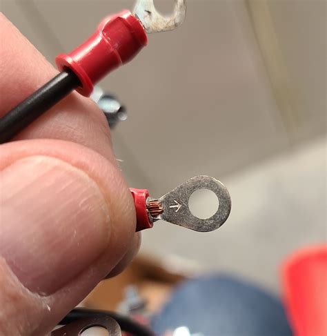 Why do crimp ring connectors have this little arrow on them? : r/askanelectrician