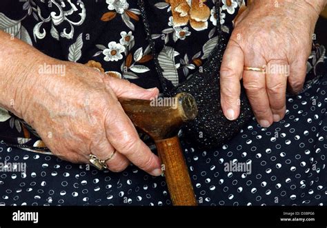 Old lady walking stick hi-res stock photography and images - Alamy