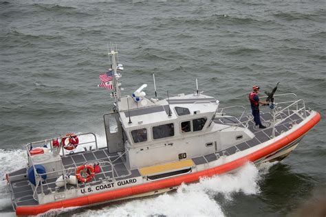 White Orange U.S. Coast Guard Boat on the Sea · Free Stock Photo