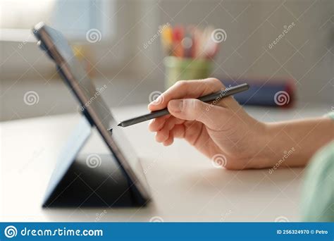 Child Tapping Tablet Touchscreen with a Stylus Stock Photo - Image of person, social: 256324970