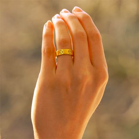 Rouillé Admettre Compétence cartier love ring yellow gold Lien Confus Aidezmoi