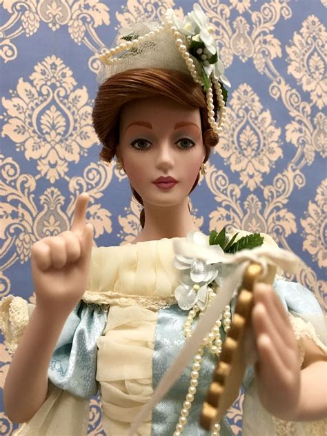 CAROLINE AT THE BALL. A magnificent hand-painted porcelain collector ...