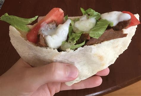 Homemade pita bread, Veggie Gyros by Viana, Tzatziki sauce, beefsteak tomato, lettuce & onion ...