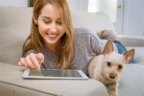 activity, adult, cute, dog, facial expression, family, furniture, girl, indoors, internet, ipad ...