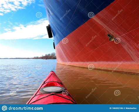 Red Kayak Near Big Ship at Danube River Stock Photo - Image of paddling, action: 186952186