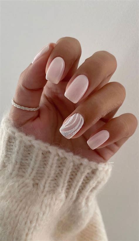 35 Nail Trends 2023 To Have on Your List : Nude Pink + White Swirl Nails