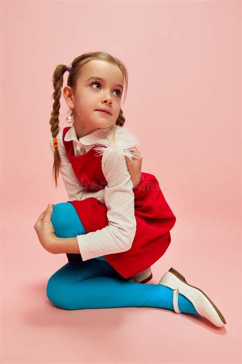 Beautiful, Cute, Lovely Kid. Girl, Child in Red Dress and Blue Tights Posing Over Pink Studio ...