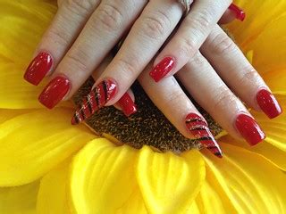 Acrylic nails with red gel polish black and silver stripes… | Flickr