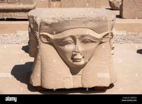 Hathor head sculpture In the outer courtyard at Denderah Temple, near ...