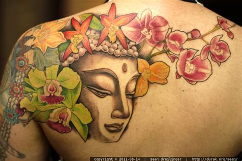 photo: new tattoo buddha on rachel's back - by seandreilinger