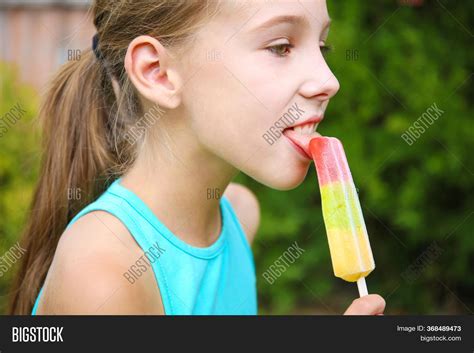 Happy Girl Eating Ice Image & Photo (Free Trial) | Bigstock