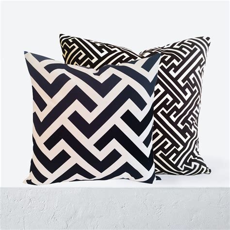 These two black and white Geometric cushions have an uplifting contemporary vibe. You can either ...