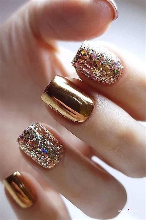 Elegant Gold and Black Nails