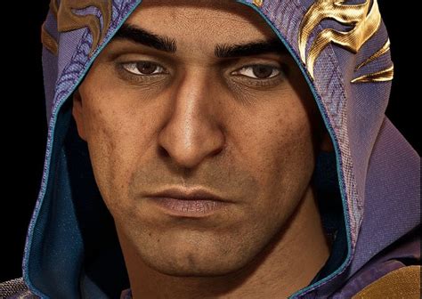 a close up of a man wearing a purple hoodie and gold accents on his face