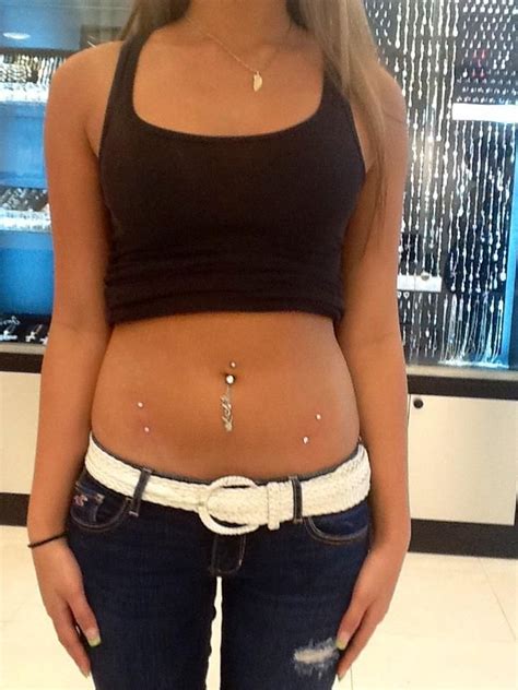 Navel piercing and hip surface piercing. | Hip piercings, Piercing, Belly tattoos