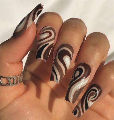 Swirl Coffin Nails | Beautiful nails, Studded nails, Brown nails