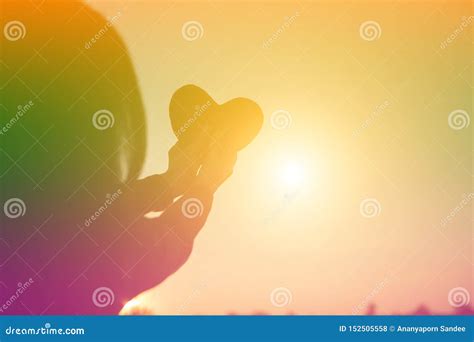 Hands Forming a Heart Shape with Sunset Silhouette Stock Photo - Image of hands, human: 152505558