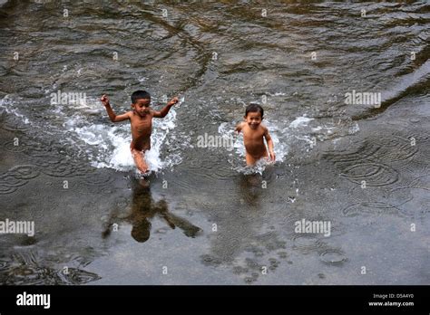 Children on River at the village of Ban Kong Lo on Laos Stock Photo, Royalty Free Image ...