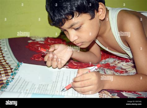 The boy writing homework Stock Photo - Alamy