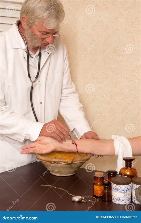 Antique Medical Procedure Of Letting Blood Stock Photos - Image: 33433653