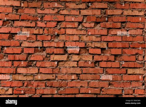 Grungy cracked brick texture, natural light Stock Photo - Alamy