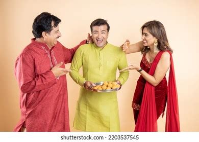 Happy Indian Family Celebrating Diwali Festival Stock Photo 2203537545 ...