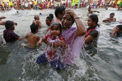 Kumbh Mela: Thousands bathe in Godavari river at start of ancient Hindu ...