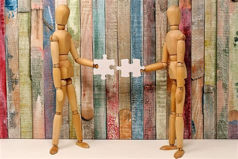 closeup, photo, two, brown, wooden, mannequins, teamwork, fit together ...