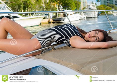 Woman Sunbathing In A Boat Deck Stock Photo - Image of lauderdale, boating: 32428020
