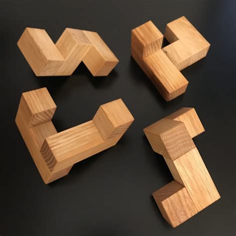 Stewart Coffin's Puzzle Design #93; the Four Piece Cube | Wood puzzles ...